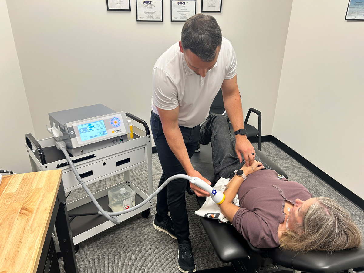 softwave therapy used on patient's elbow