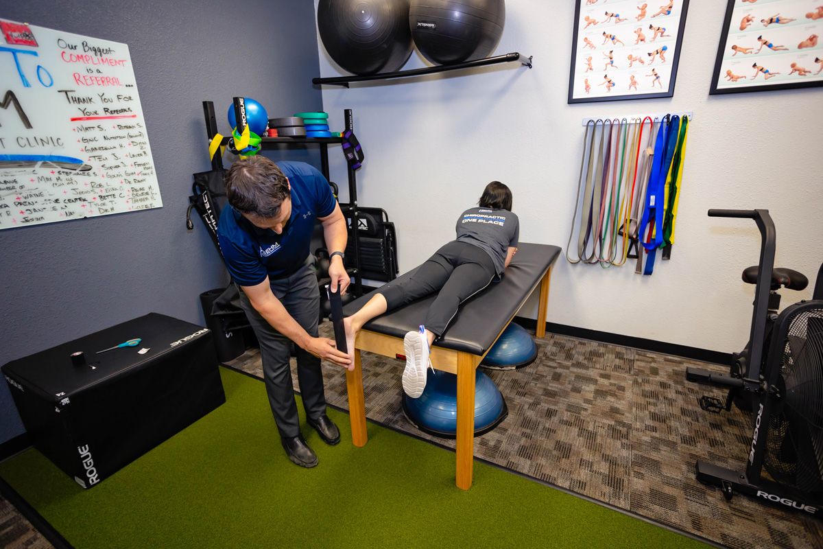 foot pain being treated with rock tape