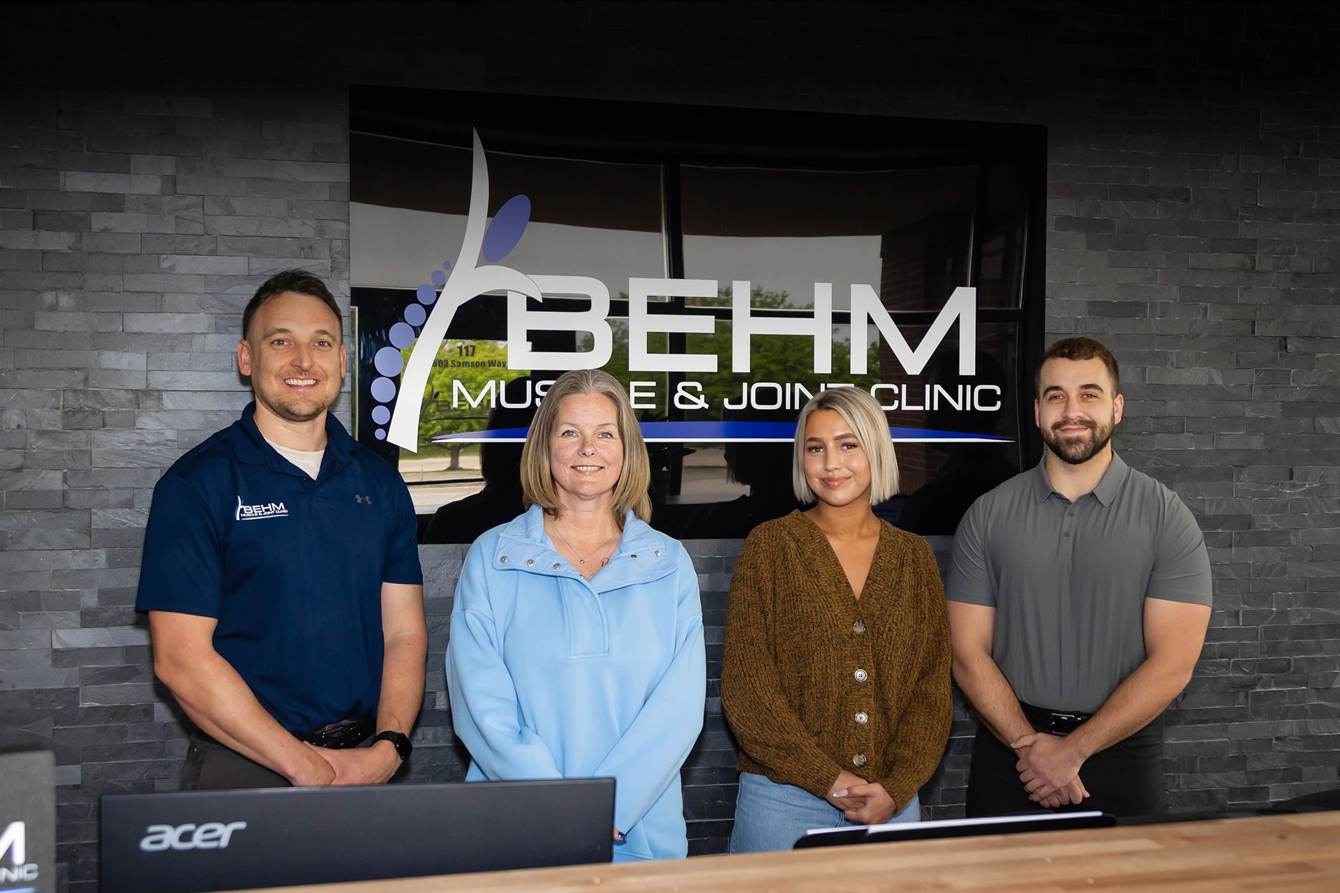 team of chiropractors shown in our chiropractic clinic in Bellevue, NE