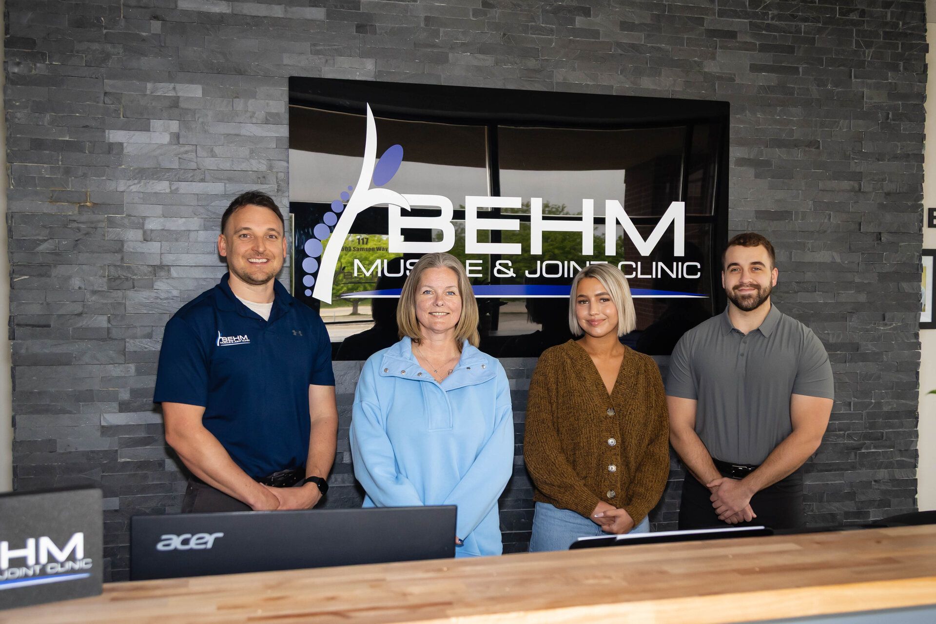 chiropractic team shown at our clinic in Bellevue, NE